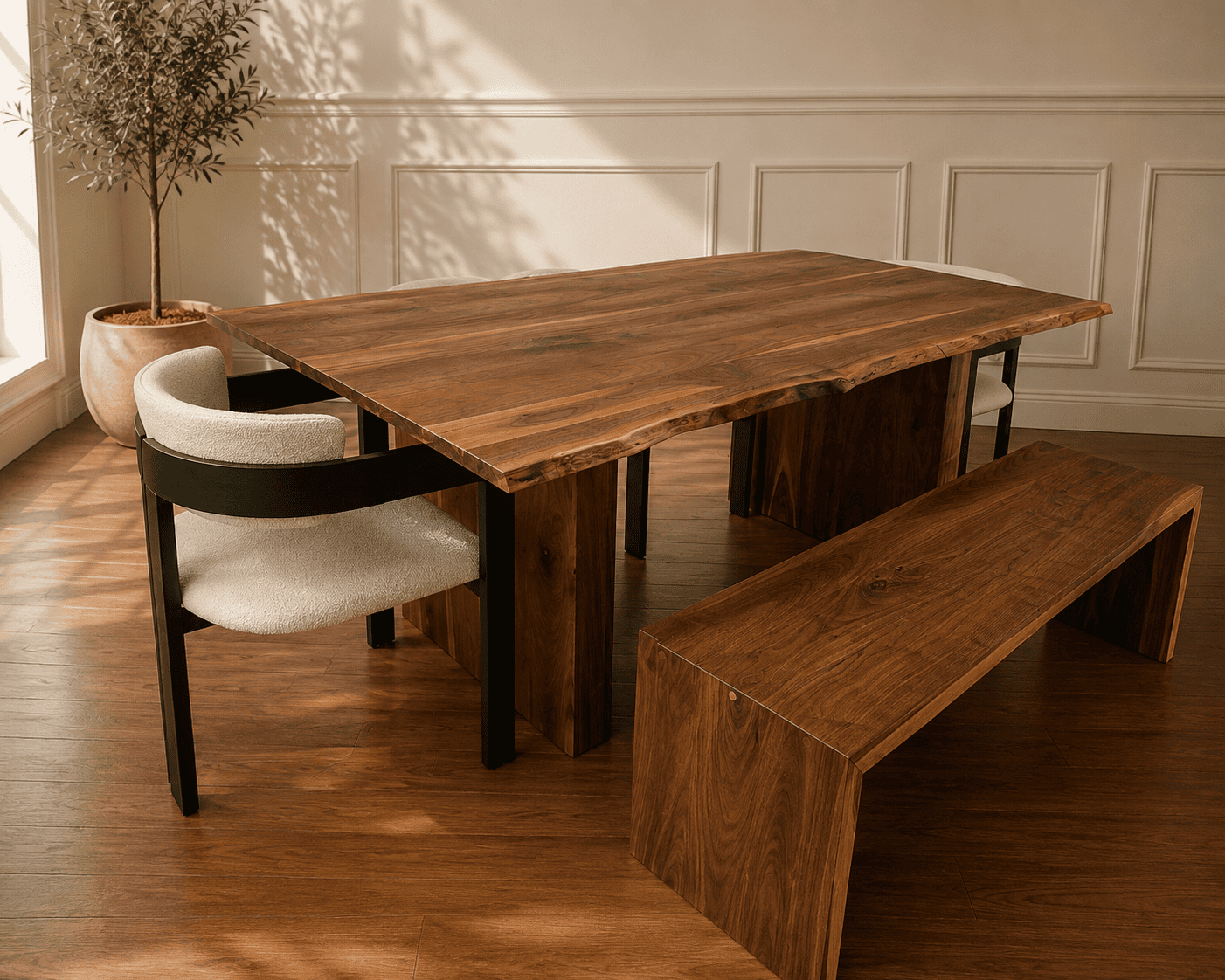 Handcrafted live edge walnut dining table with matching waterfall bench in a warm modern dining room.