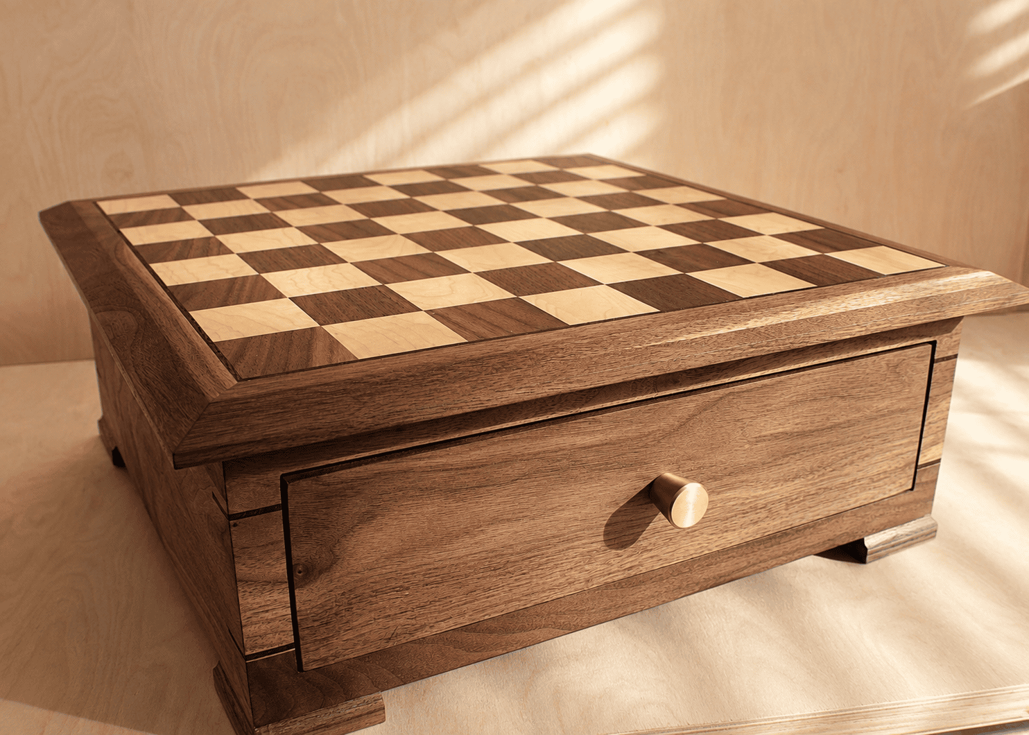 Walnut chess side table with built-in drawer and brass knob