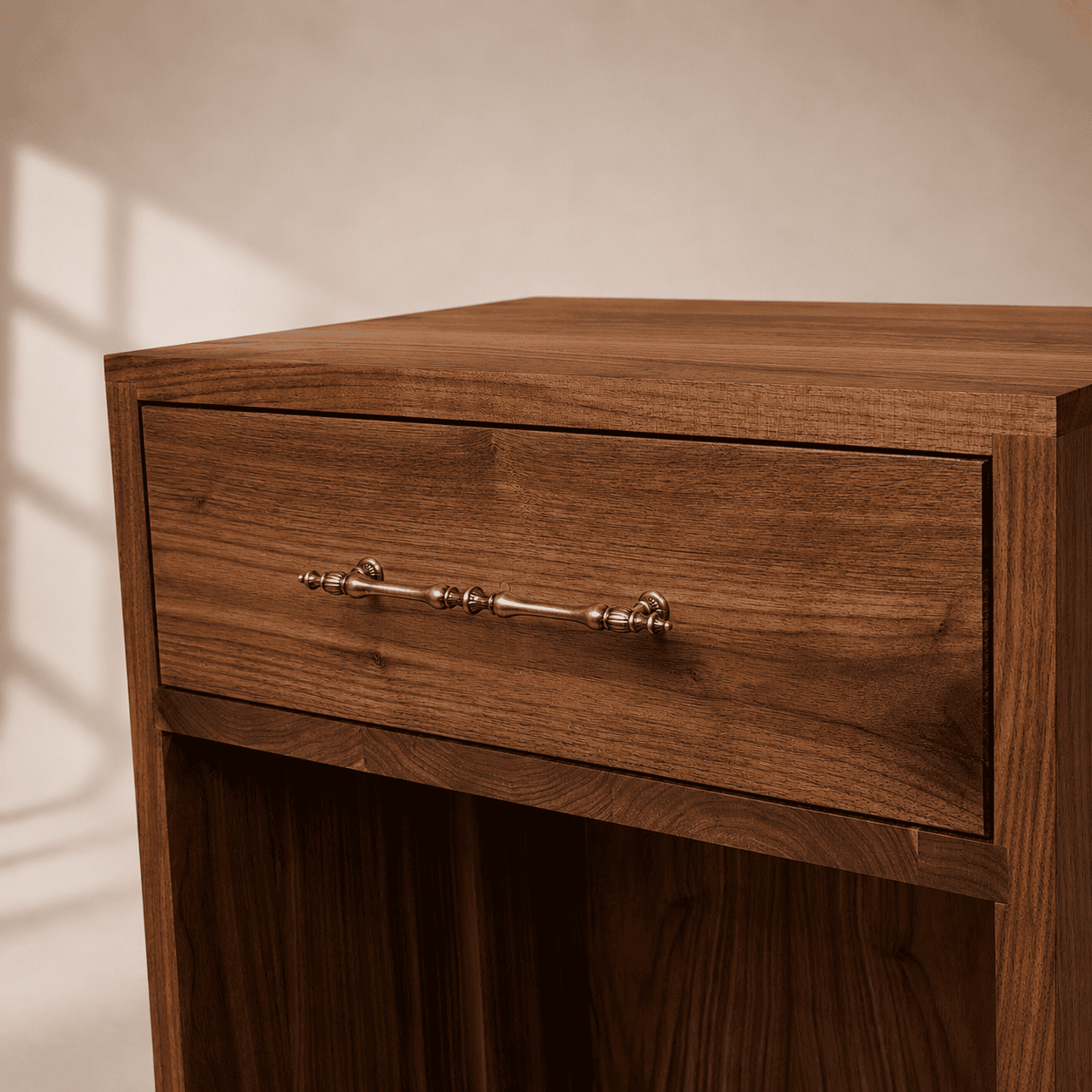 Walnut nightstand drawer with decorative brass handle and handcrafted wood grain