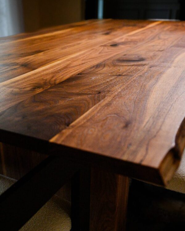 Handcrafted live edge walnut dining table with modern solid walnut pedestal base